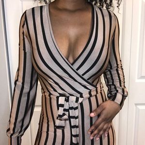 Tan and black long sleeved romper.